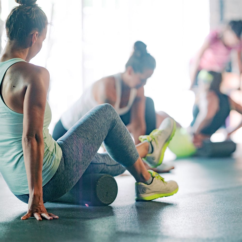 Home 5 women exercising at their group training class